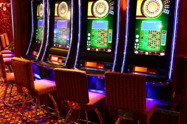 Live dealer dealing cards at No Commission Baccarat table